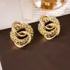 Pendientes de Aro Geométricos Entrelazados de Aguja Plateada Moda Transfronteriza Europea y Americana Pendientes de Venta Caliente Elegantes Simples Versátiles de Nicho