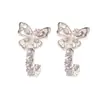 Pendientes de botón en forma de mariposa con aguja de plata s925, muy brillantes, de lujo ligero, con circonita, personalidad, moda, de alta gama, simples, versátiles, para mujer