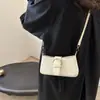 Bolso de mujer estilo baguette, nueva colección otoño 2026, bolso de hombro chic y retro, bolso cruzado versátil, venta al por mayor