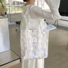 Bolsa de mano de algodón floral estilo coreano, un bolso versátil y elegante que se puede llevar en la mano o colgar al hombro, perfecto para estudiantes mujeres, ligero y con gran capacidad, ideal para llevar libros a clase