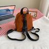 Bolso pequeño para mujer, mochila escolar de estilo británico de moda, informal, combinable, mini mochila de nicho, 2023