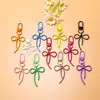 Llavero de lazo de cuentas estilo INS de colores con cinta, colgante de aleación, accesorio para niñas, charm para mochila, accesorio de hebilla para puerta