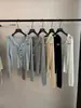 Cárdigan de punto con cuello en V y volantes estilo francés, un nuevo suéter de otoño/invierno para mujer, elegante, versátil y adelgazante