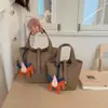 Bolso Bandolera Cruzado Fresco y Dulce para Mujer, Bolso Cubo de Nicho Estilo Coreano, Bolso de Mano Versátil para el Trabajo Nueva Moda 2026