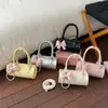 Bolsa de Mão Tendência Transfronteiriça Bolsa Cilíndrica para Mulheres 2026 Nova Bolsa Transversal Versátil Bolsa Tote Pequena Popular de Verão
