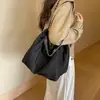 Bolsa jeans feminina grande capacidade 2026 novo estilo outono inicial versátil bolsa de ombro com corrente bolsa de tecido toque de alta qualidade bolsa tote