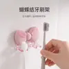 Soporte para cepillos de dientes sin perforaciones en forma de lazo, organizador de cepillos de dientes para baño montado en la pared, estante simple para almacenamiento de cepillos de dientes en el baño