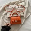 Bolsa feminina fresca e simples, novo modelo outono 2026, bolsa quadrada pequena com fecho, bolsa de ombro e transversal minimalista de alta qualidade estilo coreano para mulheres