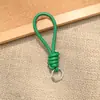 Bolsa de Corda de Couro PU Colorida Pingente Estilo Miu Simples Versátil Charme de Bolsa Chaveiro Acessório Lanyard de Celular Estilo Curto Novo