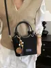 Yuezhi 2026 outono inicial nova moda versátil casual simples bolsa transversal para sair, bolsa tipo balde versátil, bolsa pequena popular