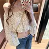 Top de lunares estilo francés con hombros descubiertos para mujer, nuevo modelo primavera 2026, color de la foto, camisa de manga larga con un elegante diseño de hombros descubiertos