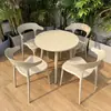 Conjunto de mesa redonda grande de acero al carbono de moda con sillas para áreas exteriores, restaurantes al aire libre, bares, tienda de barbacoa de acero al carbono impermeable, uso comercial
