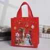 Bolsas de regalo rojas en stock, bolsas de tela no tejida serie navideña, bolsas de regalo tipo tote con sensación de alta gama