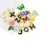 Materiales nuevos para joyería DIY transfronterizos accesorios de aleación gota de aceite 26 letras inglesas pulsera collar pendientes colgante