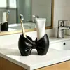 Soporte para cepillos de dientes con forma de lazo Sin instalación Plástico Soporte de almacenamiento Baño Dormitorio Tipo bolígrafo Soporte de exhibición para cepillos de dientes