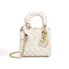 Bolso Princesa Diana Mate para Mujer 2026 Modelo Nuevo Blanco Moda Elegante Gama Alta Lujo Ligero Bolso de Mano de Diseñador Bolso Cruzado Pequeño