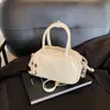 Bolsa Feminina Cartoon Fofa de Nicho Nova Primavera Moda Personalizada Bolsa Transversal Coração de Menina Pequena para Levar na Mão