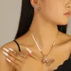 Collar con Colgante de Flor Hueca Pétalo de Tres Dimensiones Cadena Larga Pendientes Collar Anillo Set de Joyería Transfronterizo Europeo y Americano