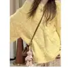 Suéter casual cruzado de estilo coreano, sin hombros, adelgazante, un nuevo top popular para mujer este año, blusa única y súper elegante