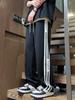 Pantalones casuales de marca de moda de estilo Hong Kong para hombre, pantalones largos deportivos con rayas laterales, novedad de verano de 2024, una tienda
