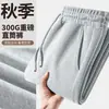 Pantalones de hombre de peso pesado transfronterizos, pantalones casuales de primavera y otoño para pareja de talla grande, pantalones rectos versátiles de moda holgados para hombre