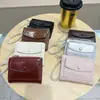 Daini Versión Coreana Nuevo Patrón Agrietado Color Sólido Simple Colgante de Lazo de Perla 80% de descuento Cierre de Cremallera Cartera Corta