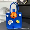 Nuevo Bolso de Mano de Fieltro de Dibujos Animados Bolso Tote Souvenir de Boda para Bebé Bolsa de Fieltro Bolsa de Regalo de Promoción Publicitaria