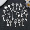 Lote de 20 llaveros de aleación retro creativos DIY, pendientes y colgantes, accesorios de joyería populares.