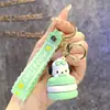 Llavero de Muñeca de Dibujos Animados Sanrio Kulomi, Colgante de Máquina de Bolas, Llavero Lindo para Bolsos, Pequeño Regalo al por Mayor