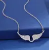 Acero de Titanio Nuevo Collar Completo de Diamantes Alas de Ángel para Mujer Lujo Ligero Moda Versátil Temperamento Colgante de Circonita Joyería al por Mayor