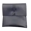 2025 Nueva Bolsa Plegable de Cuero PU Negra Simple Portátil Bolsa para Auriculares Bolsa de Almacenamiento para Joyas y Llaves