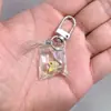 SHEIN TEMU Chaveiro Explosivo Peixe Dourado Transparente Peixinho Chaveiro de Resina Pingente de Joia Acessórios