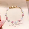 Pulsera geométrica de flor de zirconio con cierre de broche, europea y americana, pulsera vintage de nicho de alta gama, joyería versátil y elegante para mujer