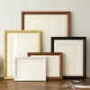 Marco de fotos marco vacío mesa pantalla a4a3 caligrafía y pintura montaje marco de fotos colgante de pared rompecabezas soporte de pantalla 4K marco de fotos de madera maciza DIY