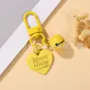 Estilo Casual y Lindo Llavero Colgante de Campana con Corazón Pintado Colorido Funda para Teléfono Móvil Bolso Auriculares Set de Accesorios Pequeños