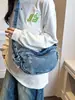 Bolso bandolera retro de mezclilla de nicho transfronterizo para mujer, nuevo estilo casual relajado 2026, bolso cruzado para el día a día