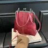 2026 Nueva Bolsa Vintage de Cuero Suave para Mujer, Bolso de Hombro Cruzado de Moda para Dama, Bolso de Pinza de Mano para Comercio Transfronterizo