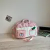 Bolsa de equipaje estilo japonés soft girl con bloques de color de manzana y ventana transparente, se puede llevar en la mano o usar como bandolera, juvenil y vibrante, adecuada para estudiantes universitarios