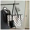Bolso de hombro tipo tote grande de lunares europeo y americano transfronterizo para mujer 2026 moderno para el trabajo y los desplazamientos, elegante y casual