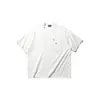 Camiseta casual estilo retro Nanxia, nuevo modelo de verano, estilo japonés, color liso, decoración de bolsillo, manga corta, unisex