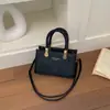 Bolso pequeño cuadrado texturizado, minimalista y elegante, un diseño nuevo, casual y único para mujer, perfecto para la primavera de 2026, un bolso de hombro o bandolera a la moda