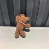 Novos estilos de outono e inverno: Pingentes de sapato de urso com flocagem, acessórios de sapato estilo Birkenstock, pingentes de franja estilo bota de treino alemã, fivelas de cadarço flor poá retrô e laço