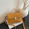 Bolso de mano de moda nuevo para comercio transfronterizo, bolso pequeño cuadrado versátil con cierre sencillo, sensación de alta gama, bolso cruzado para mujer