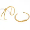 Wanxing Europeo y Americano Acero Inoxidable 18K Línea Asimétrica Abierto Pulsera Única Elegante Transfronterizo Más Vendido Pulsera Que No Se Desvanece