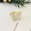 Anillo de acero inoxidable con mariposa cruzada, nuevo, francés, suave, romántico, diseño de nicho, dulce, versátil, sensación de alta gama, joyería para la mano