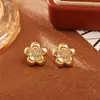 Pendientes de botón florales de circón cepillado de alta gama, pendientes de diseño pequeño personalizado a la moda para mujer, collar chapado en cobre y oro real