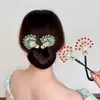 Modelador de Coque com Cabelo de Cauda de Pavão 2025 Novo High-End Prendedor Torcido para Nuca Grampo de Pena Acessório de Cabelo para Mulheres