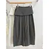 Pantalones casuales de estilo coreano de dos piezas falsas para mujer con diseño de lazo en la espalda, nuevo modelo de verano 2026, pantalones de pierna ancha de color liso simple
