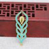 Yiwu color rayo dorado cobre chapado en oro DIY punto Cui imitación oro azul ardiente esmalte accesorios de pluma de pavo real fénix B3227