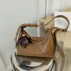 Bolso Melanoid para Axila de Mujer 2026 Nuevo Estilo Tendencia Otoño Retro para el Trabajo Bolso de Hombro Único Bolso Cruzado Versátil de Moda